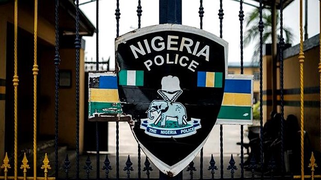 Nigeria Police Force logo on a gate